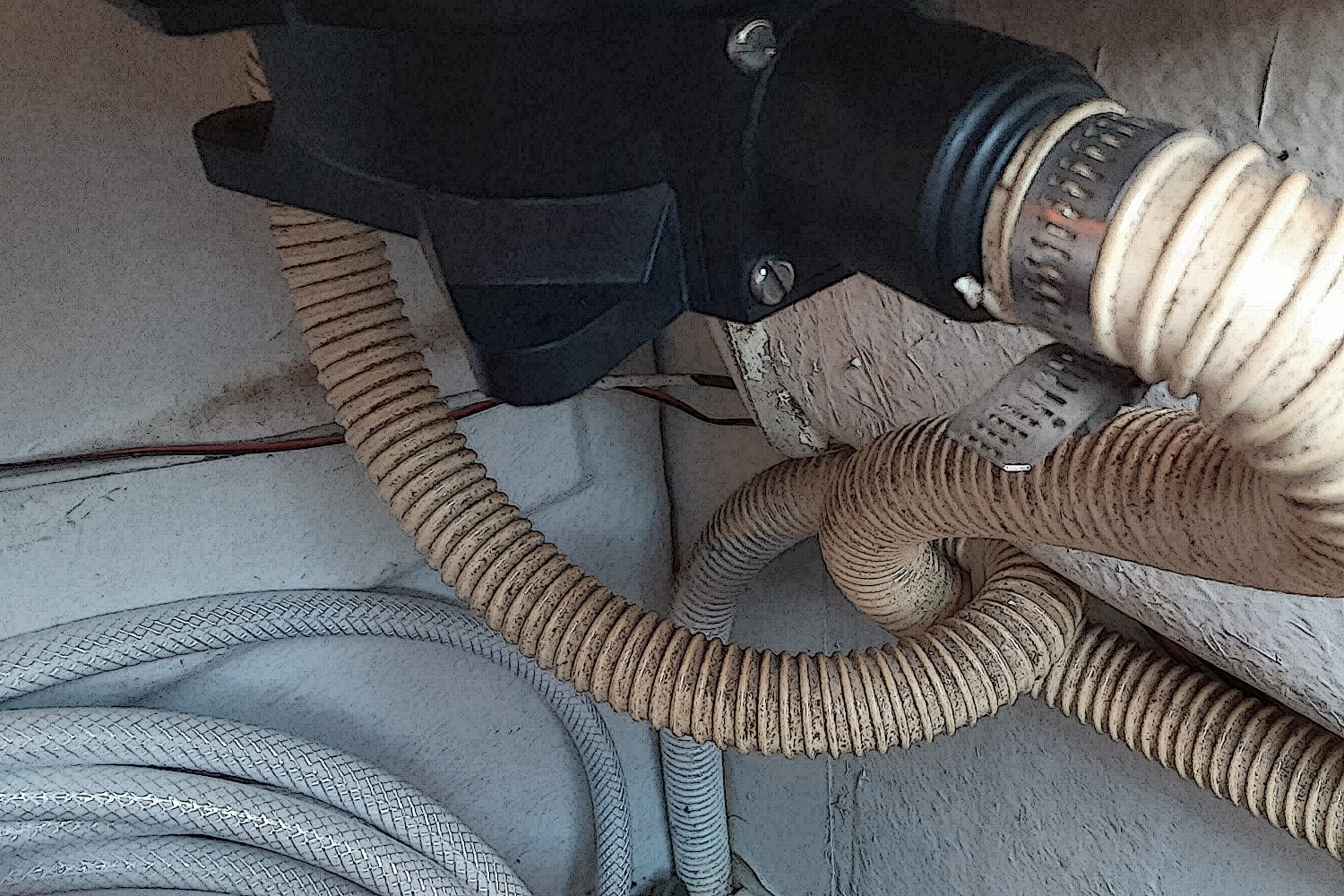 Photo of hoses in a boat’s compartment